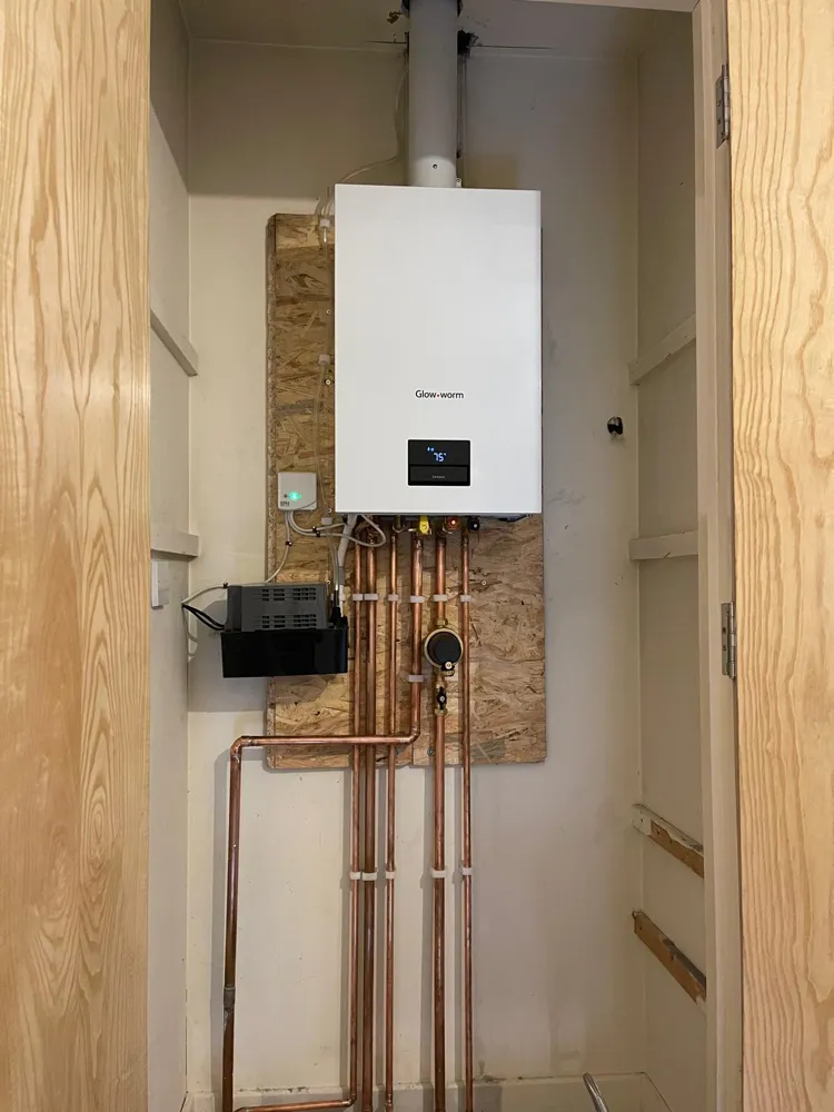 A Glow-worm combi fitted in a cupboard